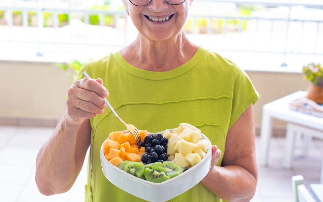 senior eating fruits